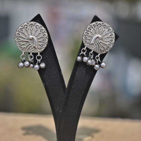 Elegant Silver-Toned Peacock Jhumka Earrings - UB Jewellerys 