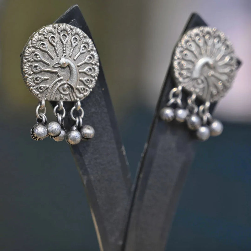 Elegant Silver-Toned Peacock Jhumka Earrings - UB Jewellerys 